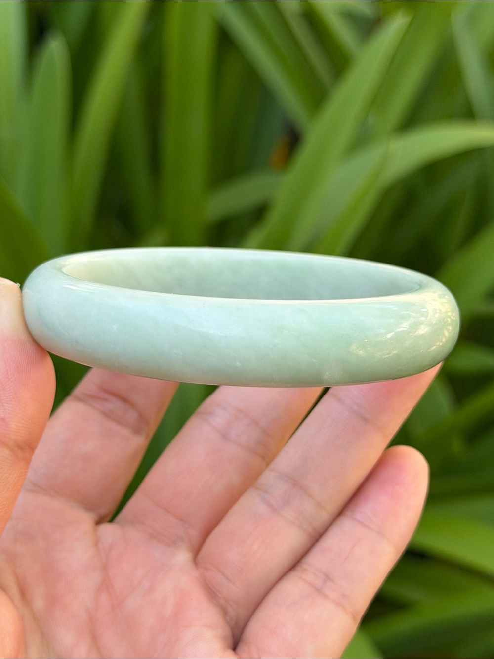 63mm inner diameter light green xiuyu bangle 1905